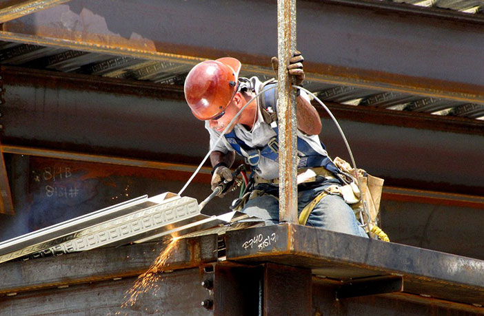 completing a challenging metal welding task on a construction site
